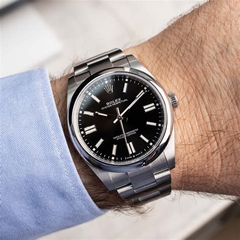 rolex oyster perpetual 26mm black dial|Rolex Oyster Perpetual 41mm silver.